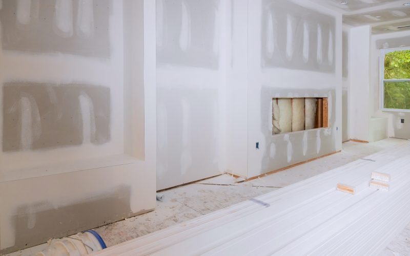 House hall interior with drywall completely installed and painted wall